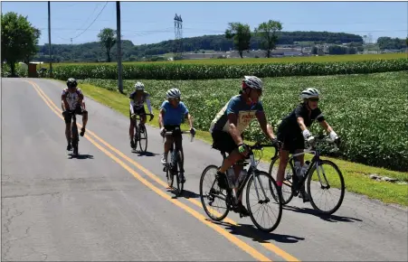 ?? SUBMITTED PHOTO — JARED COFFIN ?? Cyclists ride along the countrysid­e of Northern Berks during the 13th annual Brake the Cycle of Poverty Benefit Bike Ride for Friend Inc. Community Services on Aug. 13.