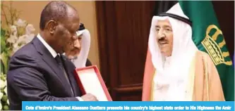  ??  ?? Cote d’Ivoire’s President Alassane Ouattara presents his country’s highest state order to His Highness the Amir Sheikh Sabah Al-Ahmad Al-Jaber Al-Sabah.