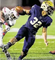  ?? Brett Coomer / Houston Chronicle ?? Klein Collins running back Justin Pratt (32) breaks away from Atascocita defensive back Justen Campell (10) but the Tigers couldn’t escape the Eagles, falling in the bi-district round of the UIL Class 6A playoffs.