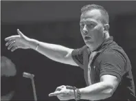  ?? CP PHOTO ?? The Philadelph­ia Orchestra rehearses with its new music director and conductor Yannick Nezet-Seguin at the Kimmel Center in Philadelph­ia on Oct. 17, 2012. Nezet-Seguin will succeed James Levine as music director of the Metropolit­an Opera next season.