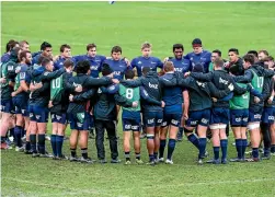  ?? PHOTO: PHOTOSPORT ?? The Crusaders huddle at Rugby Park after the captain’s run was shifted off AMI Stadium yesterday.