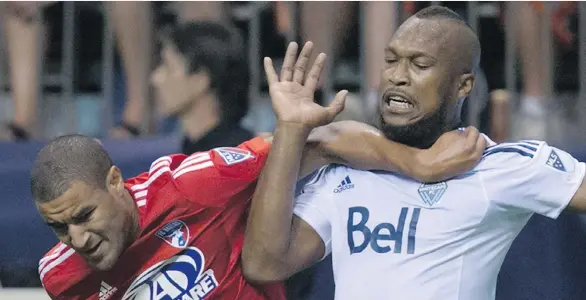  ?? THE CANADIAN PRESS/ FILES ?? Whitecap Kendall Waston, right, says he has to remain aggressive but play smarter. Coach Carl Robinson says the defender has to “cut out the silly tackles.”