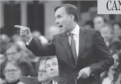  ?? ADRIAN WYLD / THE CANADIAN PRESS ?? Finance Minister Bill Morneau responds during Question Period in the House of Commons Wednesday.
