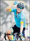  ??  ?? Colombia’s Miguel Angel Lopez celebrates as he crosses the finish line to win Stage 17 of the Tour de France cycling race over 107 kilometers (105.6 miles) from Grenoble to Meribel Col de la Loze, France
on Sept 16. (AP)