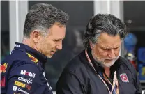  ?? WILFREDO LEE / ASSOCIATED PRESS ?? Red Bull Racing team principal Christian Horner (left) talks with Michael Andretti after the qualifying sessions for the Formula One Miami Grand Prix on Saturday at Miami Internatio­nal Autodrome.