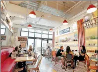  ?? Los Angeles Times/LUIS SINCO ?? At Beau Soleil Kitchen & Bar in Huntington Beach, Calif., diners can buy the home goods on display and even the chairs they sit on.