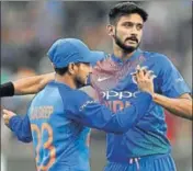  ?? AP ?? Khaleel Ahmed (right) celebrates the dismissal of Australia's D'Arcy Short with Kuldeep Yadav in Melbourne on Friday.