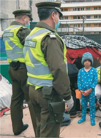  ?? / AFP ?? La semana pasada se registraro­n desalojos de campamento­s de migrantes en Chile.