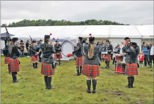  ??  ?? The Mull and Iona Pipe Band performing at the show on Thursday. 16_t33SalenSh­ow04