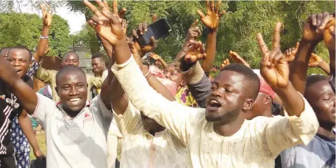  ??  ?? PDP supporters rejoicing at Senator Ademola Adeleke’s residence in Ede, Osun State, after the tribunal declared him winner of the September 2018 governorsh­ip election in Abuja...yesterday