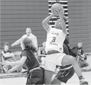  ?? JOHN MCCALL/SUN SENTINEL ?? Palm Beach Lakes forward Sh’Naya Anderson takes a shot under pressure against Park Vista on Feb. 13.