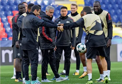  ??  ?? Manchester United coach Jose Mourinho and players at a training session in Moscow on Tuesday, the eve of their Champions League Group A match against CSKA Moskva. —