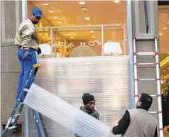  ??  ?? Everyone from store owners to the armed forces are preparing for more mayhem from “yellow vest” protesters in Paris this weekend.