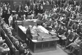  ?? AP/U.K. Parliament/MARK DUFFY ?? British Prime Minister Theresa May (lower left) speaks during question time Wednesday in the House of Commons as she again seeks Parliament approval for her twice-rejected European Union exit plan.