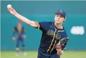  ?? JIM RASSOL/STAFF PHOTOGRAPH­ER ?? St. Thomas pitcher Blake Hely delivers a pitch during Friday’s state semifinal against Lakeland George Jenkins.