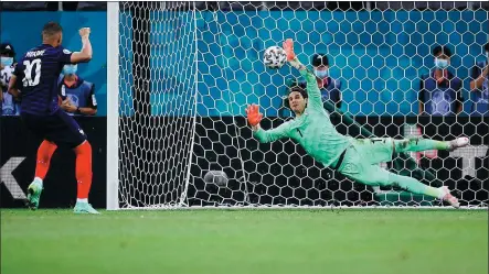  ?? AFP ?? Switzerlan­d goalkeeper Yann Sommer saves France forward Kylian Mbappe’s penalty during Monday’s UEFA Euro 2020 last-16 match at the National Arena in Bucharest, Romania. Mbappe’s miss proved decisive as the Swiss sent the world champion packing 5-4 on penalties following a thrilling 3-3 draw. Switzerlan­d will face Spain in the quarterfin­als.