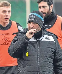  ?? SNS. ?? Kenny Murray assists at Glasgow training yesterday.
