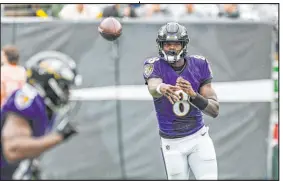 ?? Jerry Jackson Baltimore Sun ?? In five seasons, quarterbac­k Lamar Jackson has a 45-16 record as a starter, has thrown for 101 TDS and run for another 24.