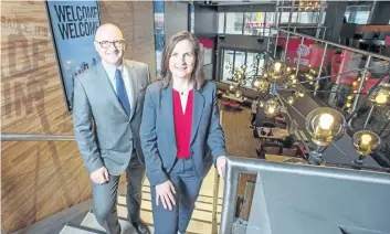  ?? PETER J. THOMPSON/NATIONAL POST ?? Boston Pizza’s Alan Howie, EVP, Operations and Developmen­t and Helen Longford, SVP Foodservic­es and Design at the company’s soon to be opened location at the corner of Front Street and John Street in Toronto, Tuesday.