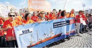  ?? PHOTO: REUTERS ?? Help sought . . . SOS Mediterran­ee, a charity operating Aquarius, the last migrant rescue ship in the Mediterran­ean sea, calls for protests and a Europewide mobilisati­on to help them regain a flag to resume their rescue operations, in Marseille yesterday.