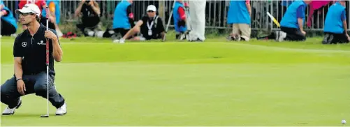  ?? Glyn Kirk, AFP/ Getty Imag
es ?? Adam Scott reacts after missing a putt to tie on the 18th green of the final round of the British Open on Sunday.