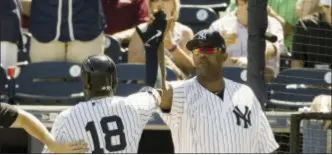  ?? MATT ROURKE — THE ASSOCIATED PRESS ?? Yankees’ CC Sabathia, right, celebrates with Didi Gregorius after Gregorius hit a home run during a spring training baseball game against the Phillies Friday in Tampa, Fla.