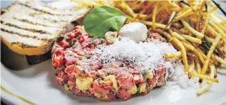  ??  ?? The beef tartare, possibly the quintessen­tial bistro dish, at Albert bistro is exemplary.