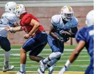  ?? STAFF PHOTO BY DOUG STRICKLAND ?? UTC running back Kyle Nall totaled 31 yards on nine carries last season as a freshman. He said he’s learning from teammate Derrick Craine, the Mocs’ No. 1 running back and a preseason FCS All-American.