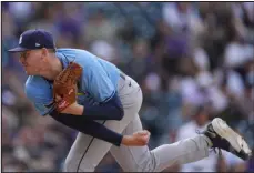  ?? DAVID ZALUBOWSKI — THE ASSOCIATED PRESS ?? Tampa Bay Rays relief pitcher Pete Fairbanks works against the Rockies during the ninth inning on Friday at Coors Field.