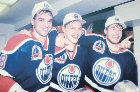  ??  ?? Former Edmonton Oilers forward Martin Gelinas, right, with linemates Joe Murphy, left, and Adam Graves. Gelinas now serves an assistant coach with the Calgary Flames.