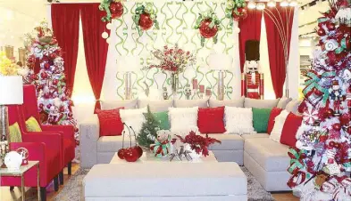  ??  ?? Entertain in a Holly Jolly Christmas style with a classic red, green, and white palette. Santa’s elves, nutcracker­s, Christmas soldiers, reindeer, bears, and Santa are all gathered to spread holiday cheer.