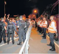  ??  ?? ANGER Rangers supporters vent their fury at the team bus