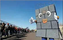  ?? JOSE LUIS GONZALEZ / REUTERS ?? A proponent of United States President Donald Trump’s border wall proposal attends a rally by the US leader in El Paso, Texas, on Monday.