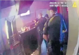  ?? CITY OF ORLANDO ?? Belle Isle Police Officer Brandon Cornwell’s body camera footage shows law enforcemen­t officers entering Pulse nightclub through a broken window during the attack that killed 49.