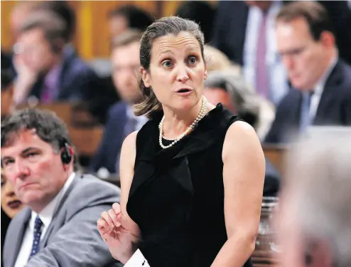  ?? DAVID KAWAI / THE CANADIAN PRESS ?? “Canada will not escalate, and Canada will not back down when we face illegal and unjust measures, we will respond,” says Canadian Foreign Affairs Minister Chrystia Freeland.