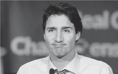  ?? NICHOLAS KAMM / AFP / GETTY IMAGES ?? Prime minister-designate Justin Trudeau must act quickly on assisted suicide, middle-class tax cuts, climate policy,
Senate reform, marijuana legalizati­on, his infrastruc­ture plan and to amend anti-terror Bill C-51.