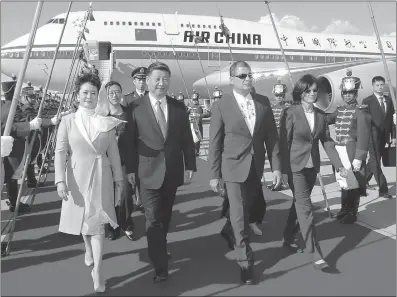  ??  ?? Chinese President Xi Jinping arrives at Quito on Thursday afternoon, kicking off his first state visit to Ecuador and his third visit to Latin America since he took office in 2013. Ecuadorian President Rafael Correa was on hand to welcome Xi at the airport.
