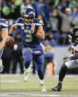  ?? OTTO GREULE JR. / GETTY IMAGES 2017 ?? Quarterbac­k Russell Wilson has two years left on his contract in Seattle, as the Seahawks franchise revamps the roster.