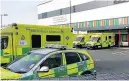  ??  ?? > Ambulances outside A&E at Ysbyty Glan Clwyd, Denbighshi­re