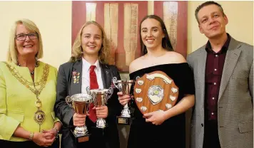  ??  ?? Mayor of Whitworth, Coun Madeleine De Souza with current Whitworth High School head girl Sian Morton, fellow student Mia Howells, and guest speaker Dr Allan Jordan.