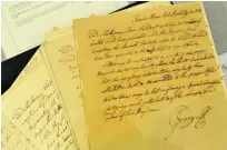  ?? Stan Honda / AFP ?? A letter by King George III on peace negotiatio­ns with America after the War of Independen­ce. Thousands of documents by the British monarch were put online yesterday.