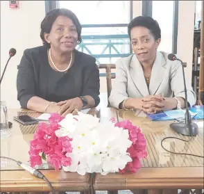  ??  ?? Valerie Odle of the CARICOM Secretaria­t and Chief of Mission Cynthia Combie-Martyr (at right) during the media briefing