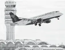  ?? MANUEL BALCE CENETA, AP ?? A jet takes off from Reagan Washington National Airport.