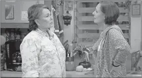  ?? ADAM ROSE/ABC VIA AP ?? In this image released by ABC, Roseanne Barr, left, and Laurie Metcalf appear in a scene from the reboot of the comedy series “Roseanne.” ABC, which canceled its “Roseanne” revival over its star’s racist tweet, said Thursday it will air a Conner family...