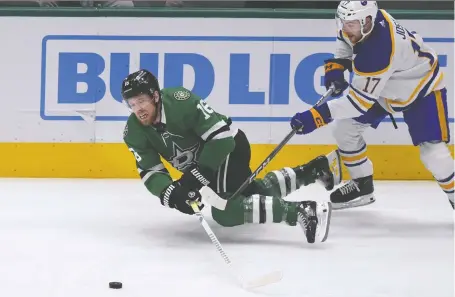  ?? LM OTERO/THE ASSOCIATED PRESS FILES ?? Dallas Stars centre Joe Pavelski, here being checked by Buffalo Sabres centre Tyson Jost on April 9, has played over 1,500 regular season and playoff games since his NHL debut in 2006. He turns 40 in July and has never won a Stanley Cup.