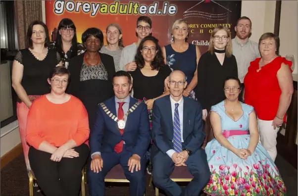  ??  ?? The Gorey Community School Adult Education awards ceremony was held in the Amber Springs Hotel recently. Pictured are Health Care level 5 recipients. Front: Tutor, Maria Fortune, Cathaoirla­ch, Cllr. John Hegarty, school principal, Michael Finn, and Barbara Murphy. Back: Sanita Krunina, Claire Monaghan, Laeub Mary Achimugy, Malgorzata Kanepajs, Pablo Celemente, Maramay Mercado, Tina Gregory, Fiona Murphy, Neil Doyle and Trish Nolan.