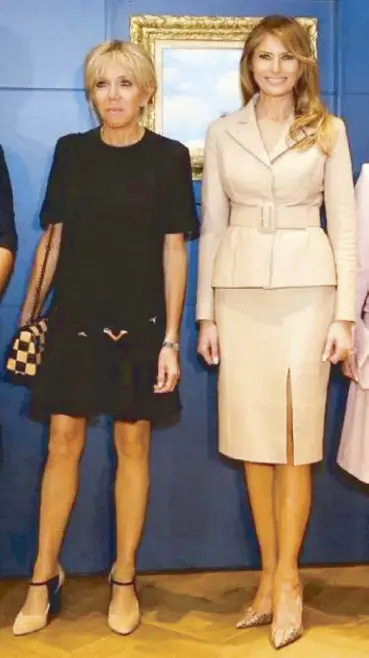  ??  ?? When Brigitte met Melania: French First Lady Brigitte Macron (left) in Louis Vuitton and US First Lady Melania Trump in Belgian designer Maison Ullens at the Magritte Museum in Belgium during the G7 Summit.