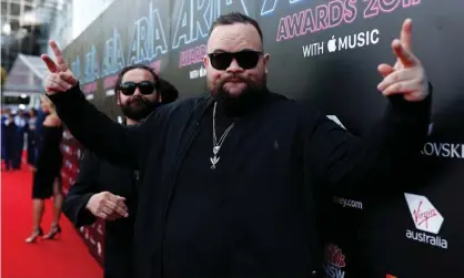  ??  ?? Trials and Briggs of AB Original at the Aria awards. Briggs says moving Triple J’s Hottest 100 from 26 January was ‘a step towards equity and inclusivit­y’. Photograph: Zak Kaczmarek/Getty Images for ARIA