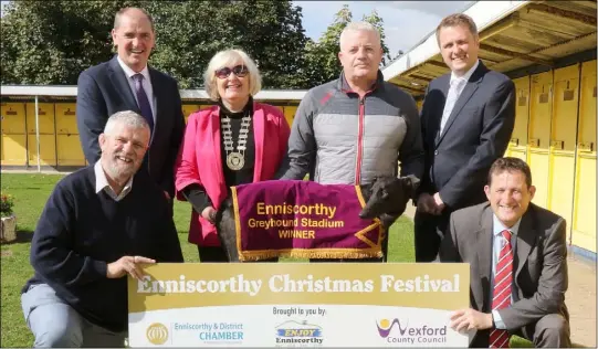  ??  ?? Back: Minister Paul Kehoe TD, Maree Lyng, president Enniscorth­y &amp; District Chamber, Jim Turner, racing manager and James Browne TD. Front: Jimmy Gahan and Myles Roban (Enniscorth­y &amp; District Chamber) at the launch of the dog night in aid of the Enniscorth­y Christmas festival.