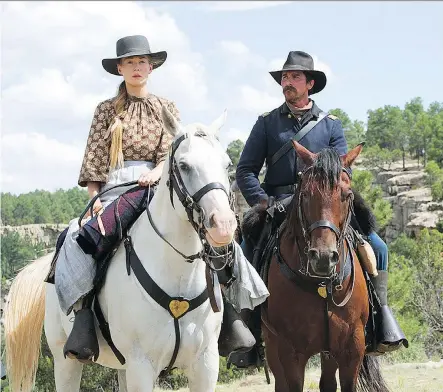  ?? PHOTOS: ENTERTAINM­ENT STUDIOS ?? Rosamund Pike, left, and Christian Bale give remarkable performanc­es in Hostiles, which joins the pantheon of great westerns, featuring memorable characters and nuanced storytelli­ng set against a beautiful, ever-changing cinematic background.